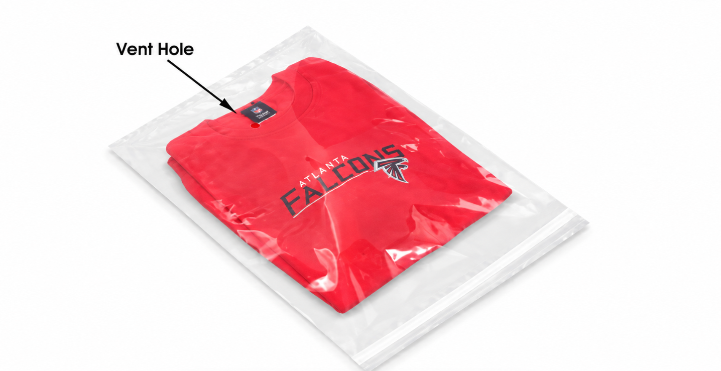 Clear PE vented poly bag with a small ventilation hole for folded apparel packaging.