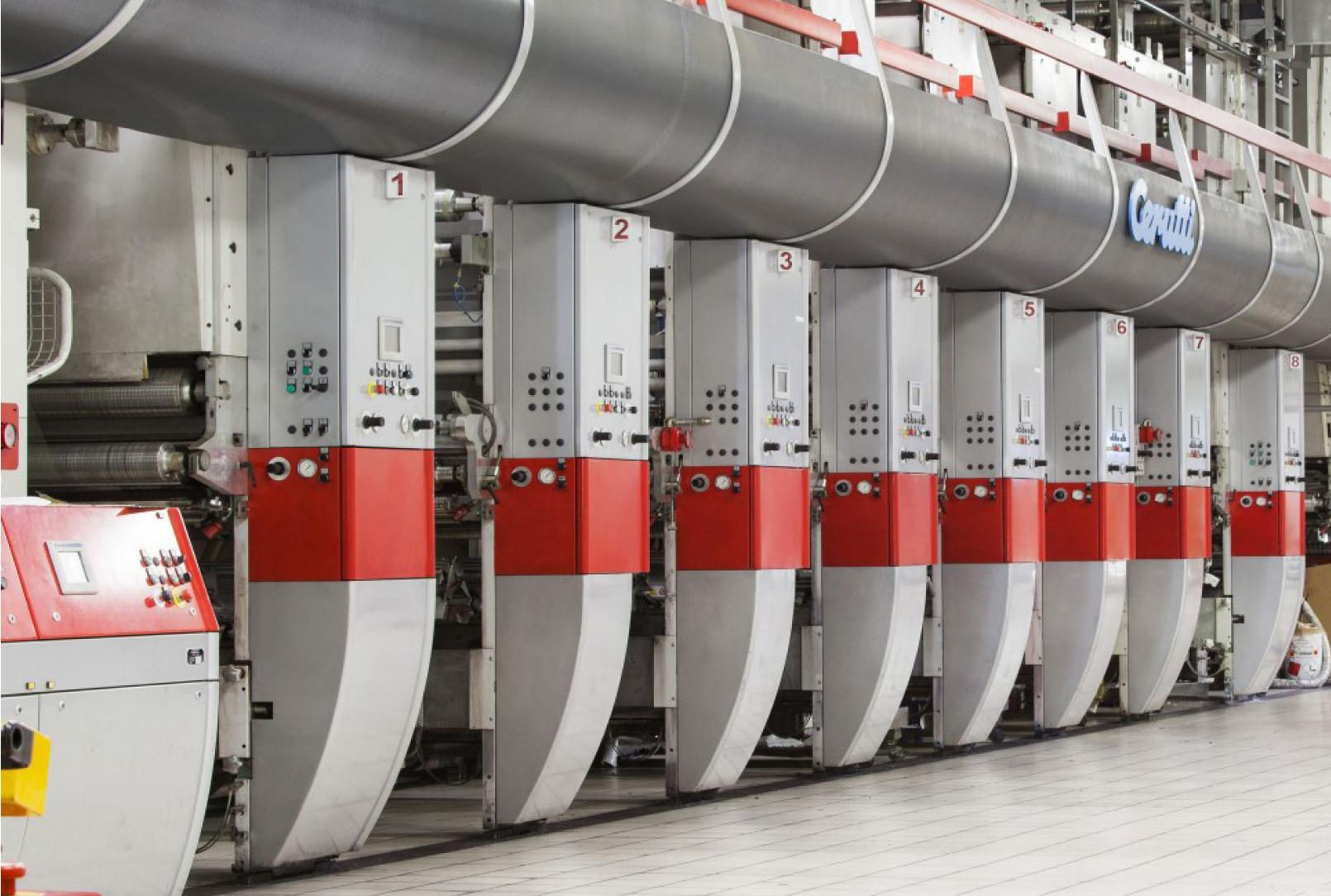Custom rotogravure printed Mylar packaging bags with engraved printing cylinders and high-volume production machinery.